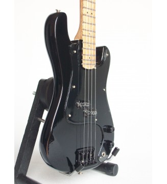 Guitare miniature basse Roger Waters Pink Floyd gros plan de côté gauche