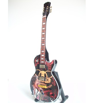 Guitare miniature Aerosmith et Steven Tyler vue de gauche en plan general