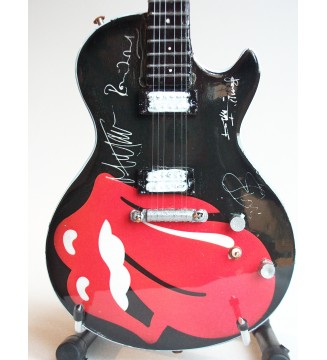 Guitare miniature hommage aux Rolling Stones gros plan vue de face